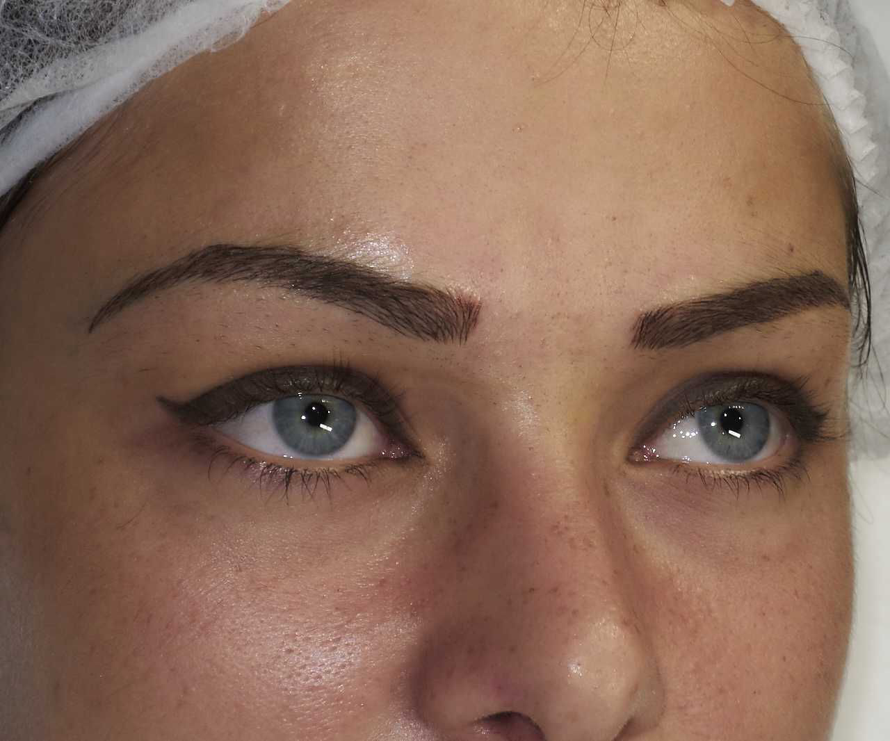 girl's eyebrow Microblading after touchup